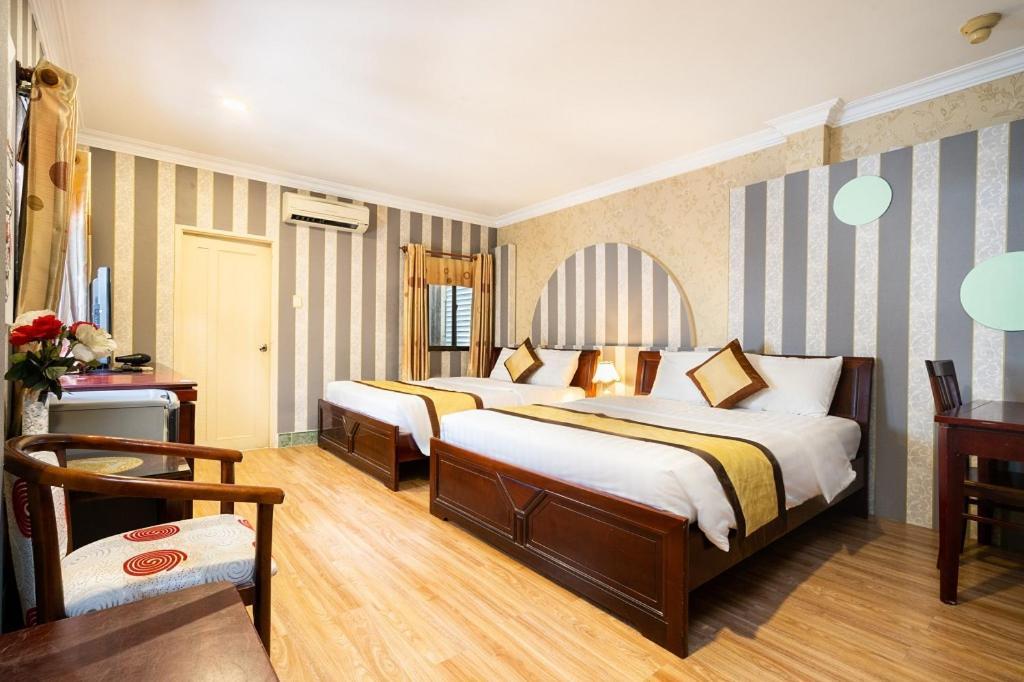 Cosmo Central Hotel Ho Chi Minh Extérieur photo