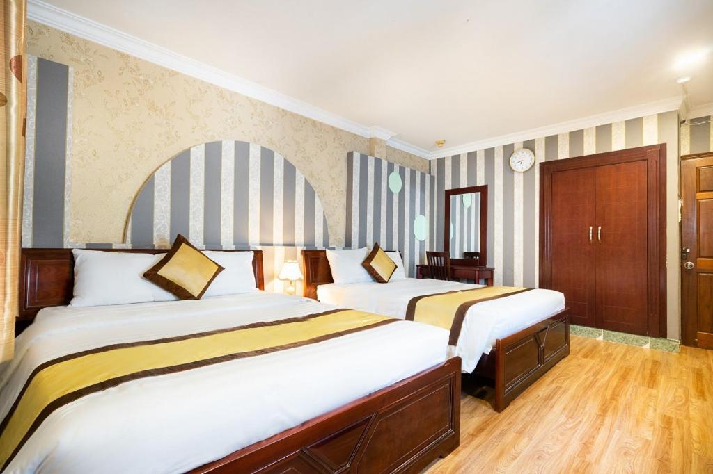 Cosmo Central Hotel Ho Chi Minh Extérieur photo