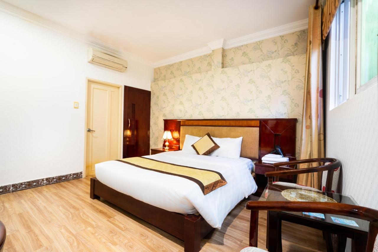 Cosmo Central Hotel Ho Chi Minh Extérieur photo