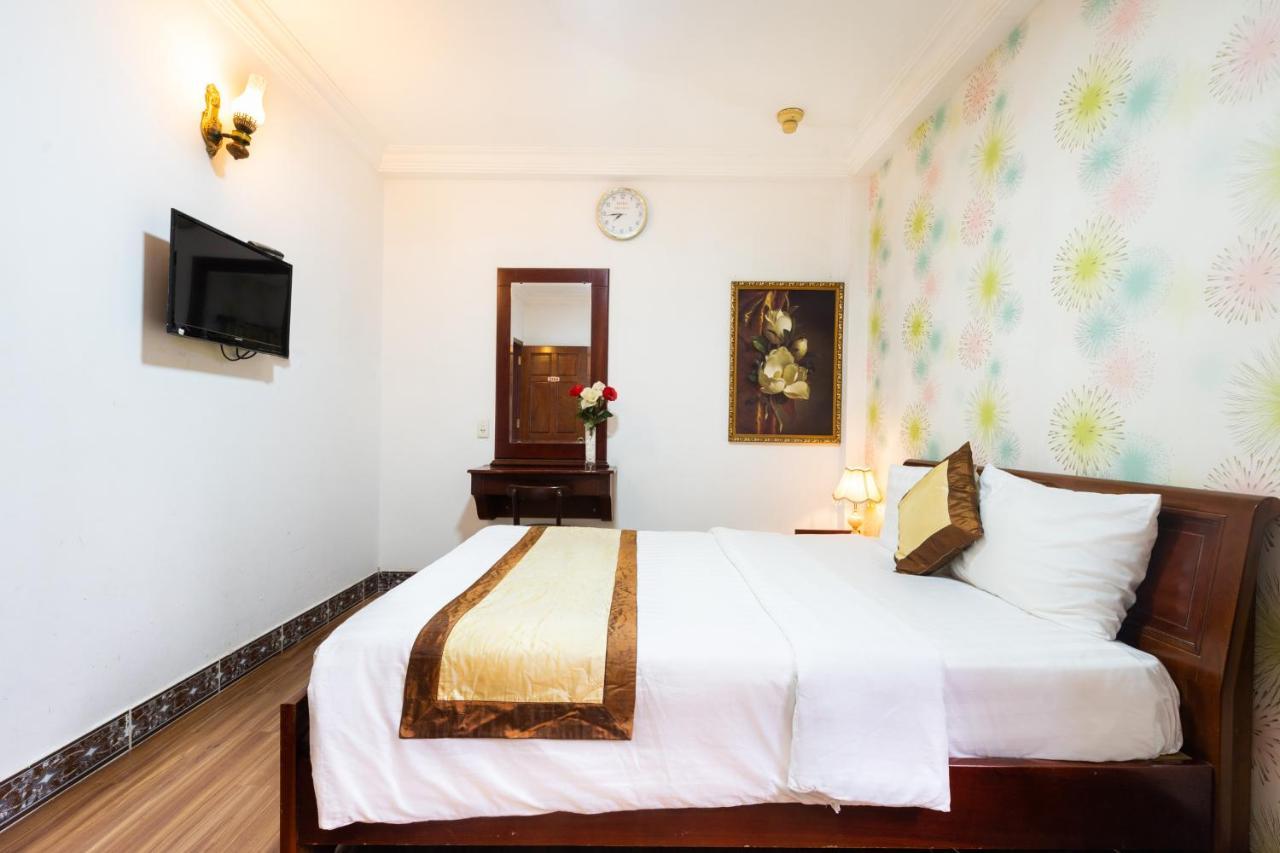 Cosmo Central Hotel Ho Chi Minh Extérieur photo