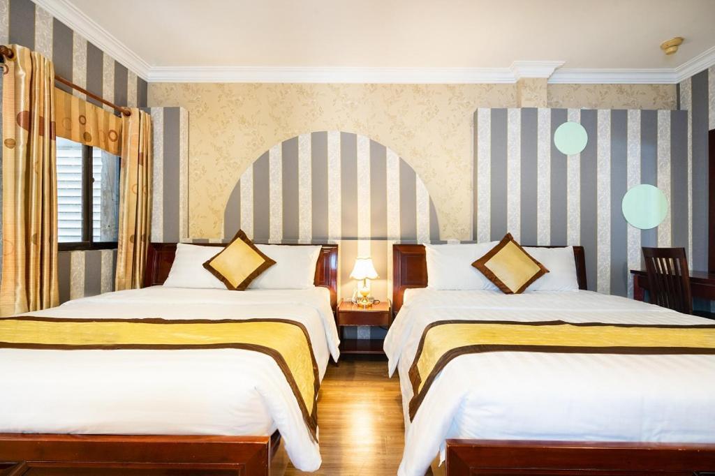 Cosmo Central Hotel Ho Chi Minh Extérieur photo